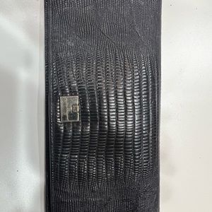 Salvatore Ferragamo textured wallet.